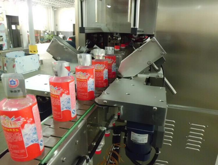 Machine à étiqueter automatique de douille de rétrécissement d'étiquette de PVC de chaleur de double tête