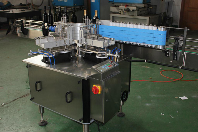Machine d'étiquetage de colle humide de pâte froide de bouteilles rondes automatiques automatiques